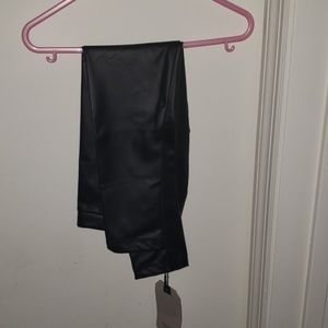 Black leather jeggings